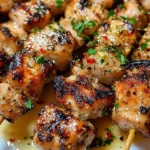 Delicious Air Fryer Garlic Parmesan Chicken Skewers on a plate