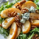 Caramelized Pear and Blue Cheese Salad featuring sweet pears, tangy blue cheese, and mixed greens.
