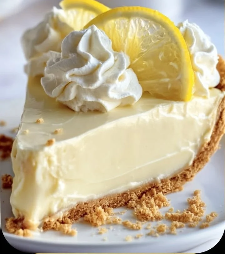 Deliciously creamy cream cheese lemonade pie with a fresh lemon topping.