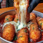 Crispy mozzarella sticks served with marinara sauce and a creamy dipping sauce