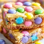 Delicious Easter cake mix cookie bars topped with pastel sprinkles.