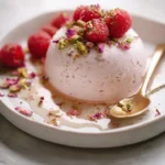 Frozen Rose Mascarpone Mousse topped with fresh raspberries