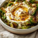 Delicious hot honey whipped feta served with crispy Brussels chips