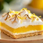 Delicious Lemon Meringue Tart Bars topped with light, fluffy meringue.