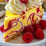 Lemon raspberry cheesecake with a creamy swirl of lemon and raspberry topping
