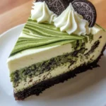 Delicious Matcha Oreo Swirl Cheesecake with vibrant green matcha and Oreo crust