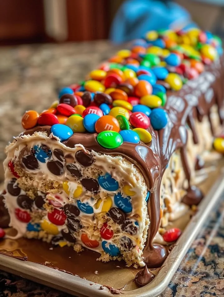 M&M's Chocolate Chip Cookie Dough Ice Cream Cake Roll dessert slice