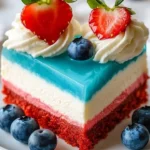 No bake patriotic cheesecake with red, white, and blue layers for festive celebrations.