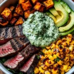 Delicious steak bowl with avocado, roasted corn, and cilantro cream sauce